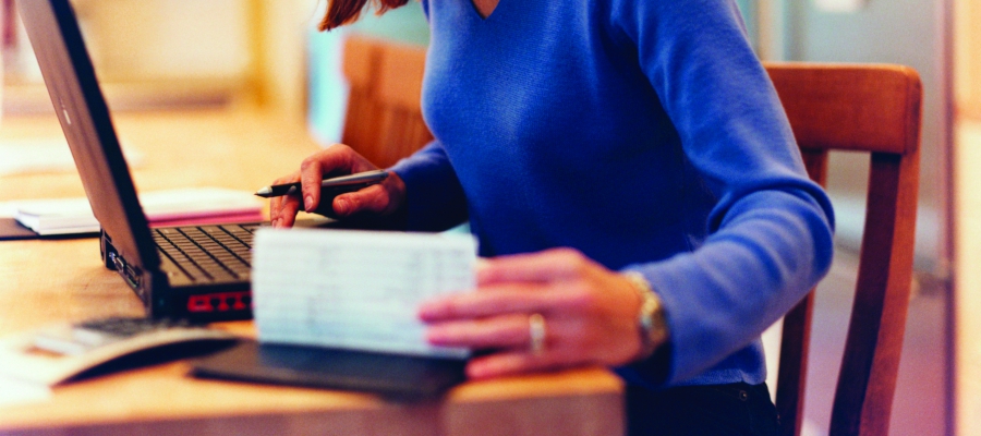 Woman paying bills 